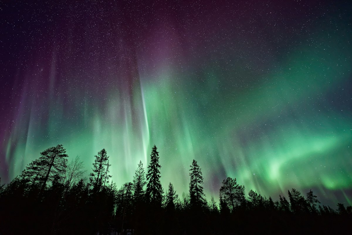 Northern lights over mountains