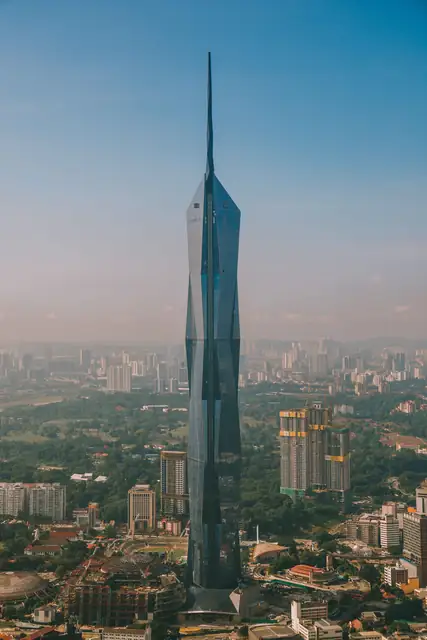 Aerial view of Merdeka 118, the iconic skyscraper in Kuala Lumpur's cityscape.